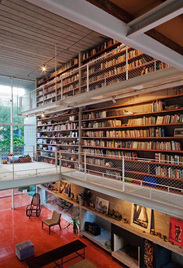 3 storey wall books creates privacy contemporary home 11 library